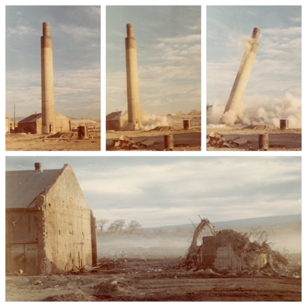 A mill tower falls during demolition.