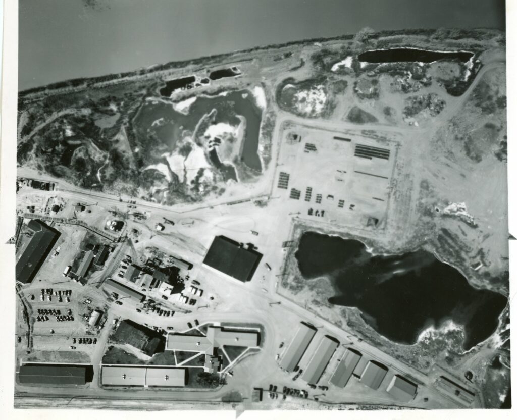 Aerial view of the AEC. An assortment of land features and buildings.